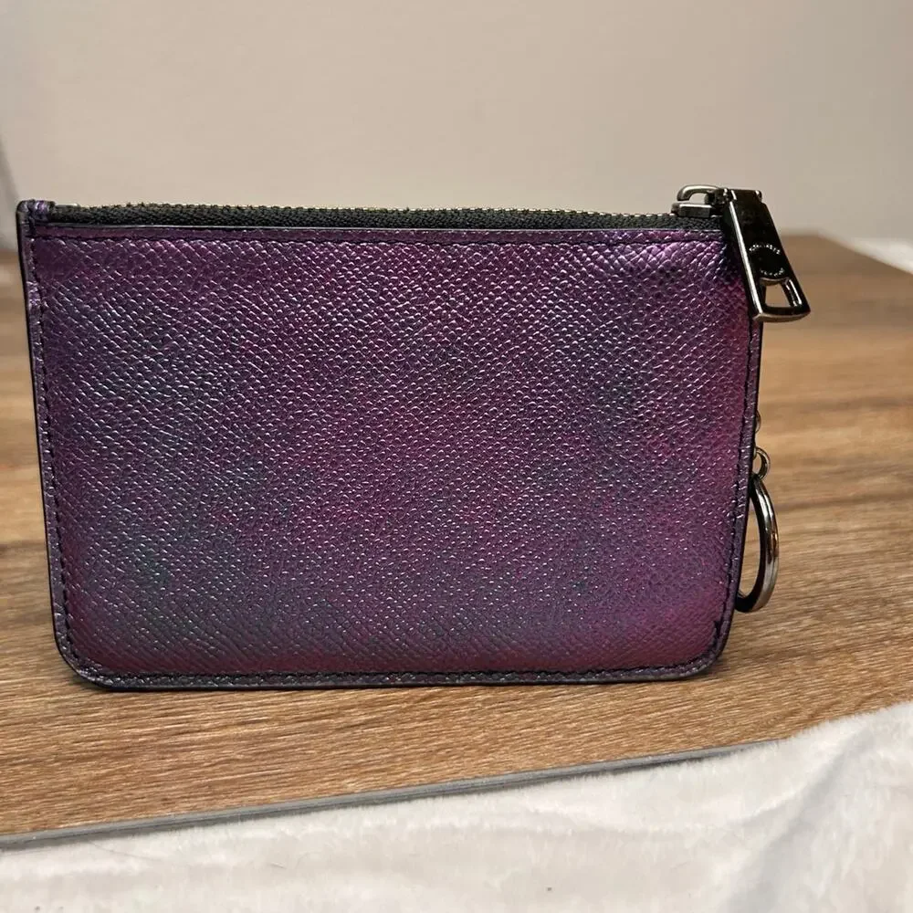 Coach purple hologram